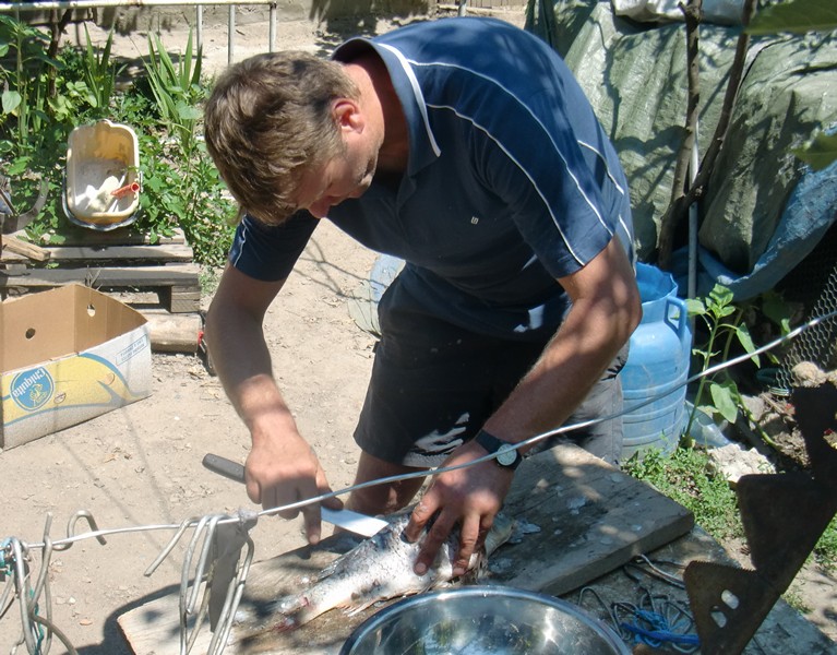 CIMG1182 Emil preparing fish